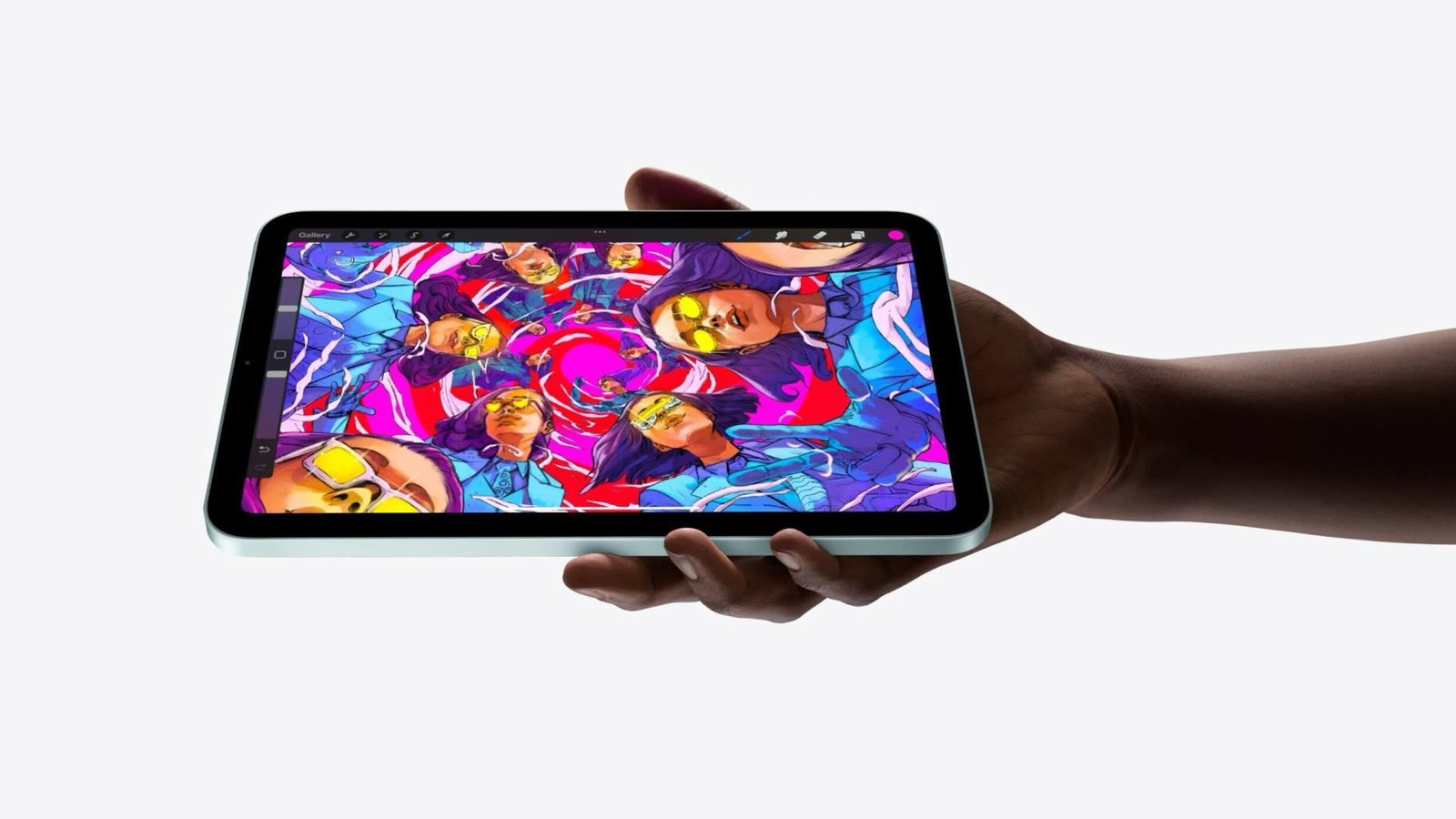 Ban tay cam iPad mini A17 Pro nam ngang, man hinh hien thi tranh minh hoa nhieu mau